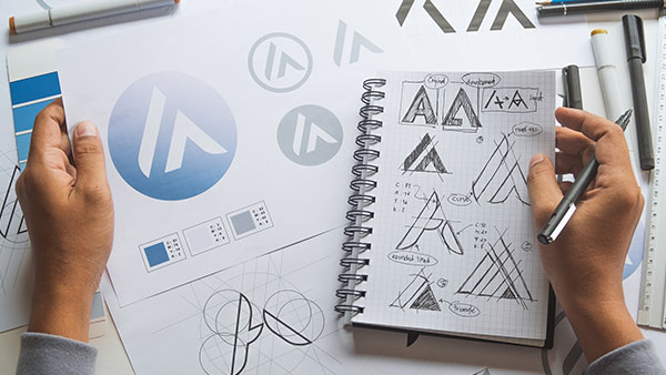 Creative ideas being sketched out on paper.