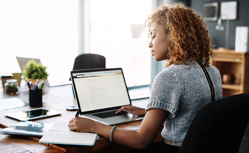 Female team member working at station