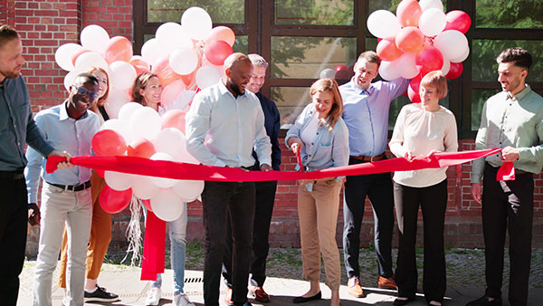 Ribbon cutting ceremony at a grand opening